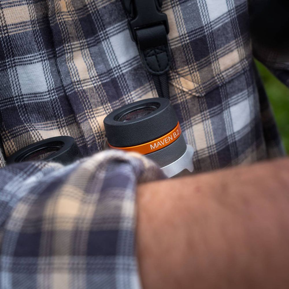 Close up of a woven tshirt and binoculars