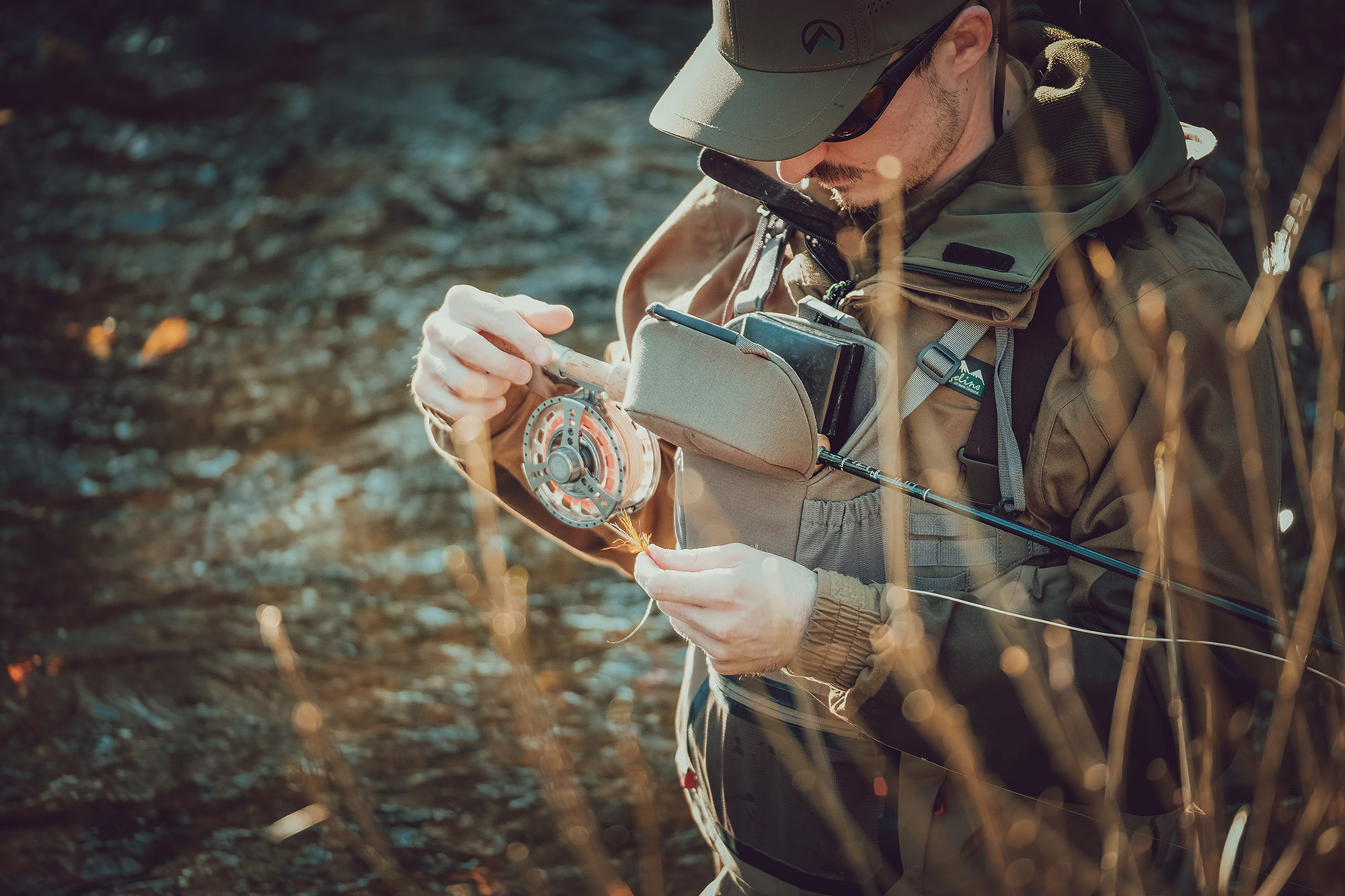 Man in the river fishing